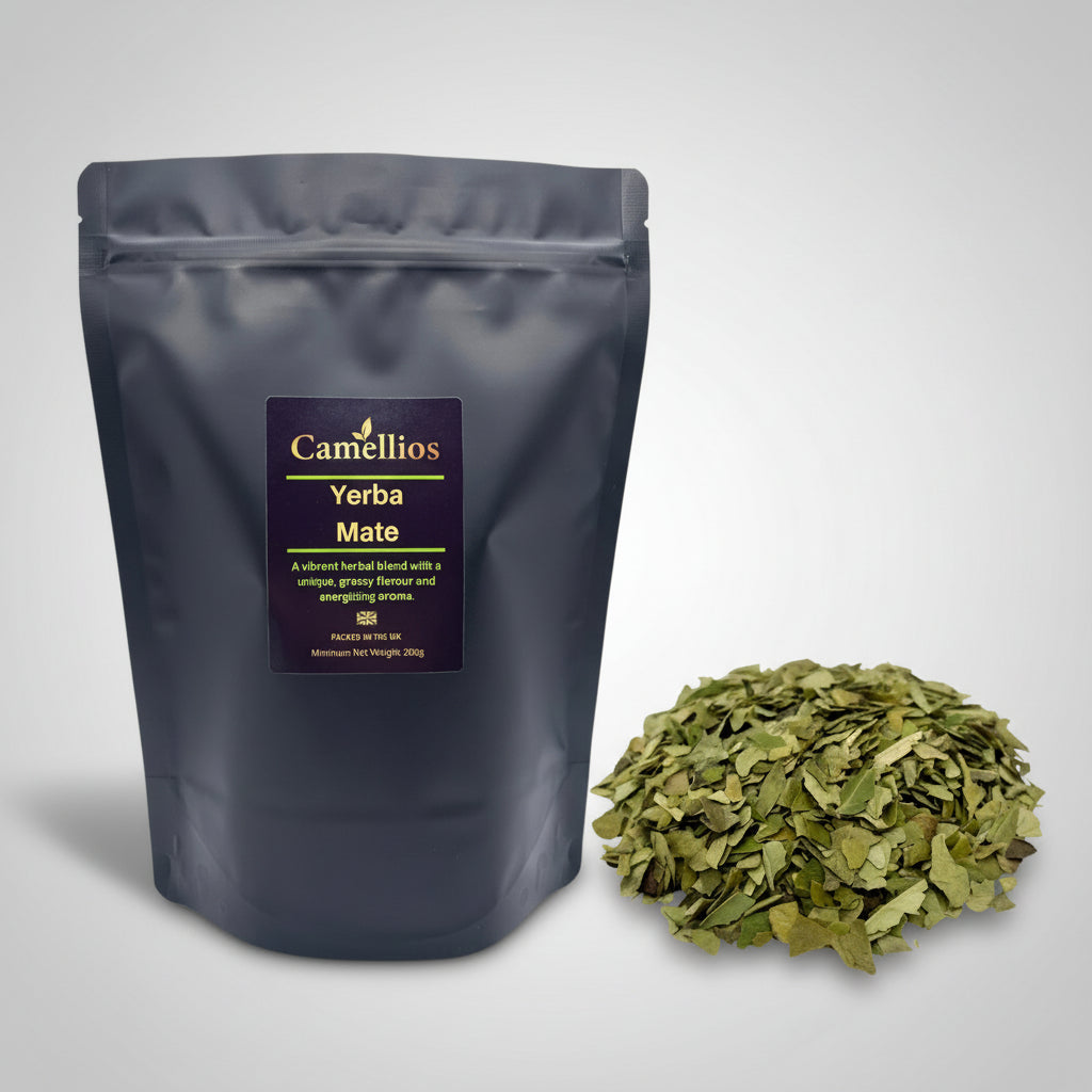 Camellios Yerba Mate package with a small pile of green leaves on a white background