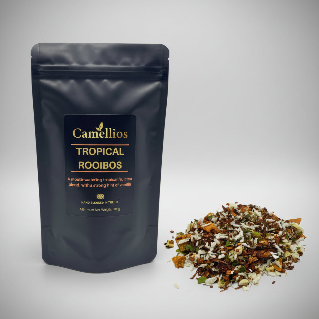 Camellios Tropical Rooibos tea package with loose tea leaves on a white background