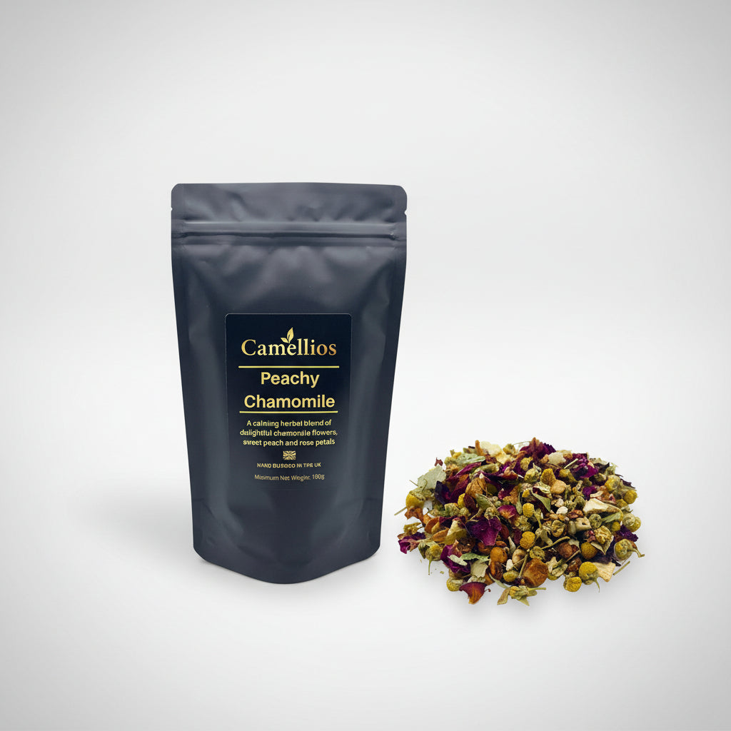 Camellios Peachy Chamomile tea package with a pile of dried herbs on a white background
