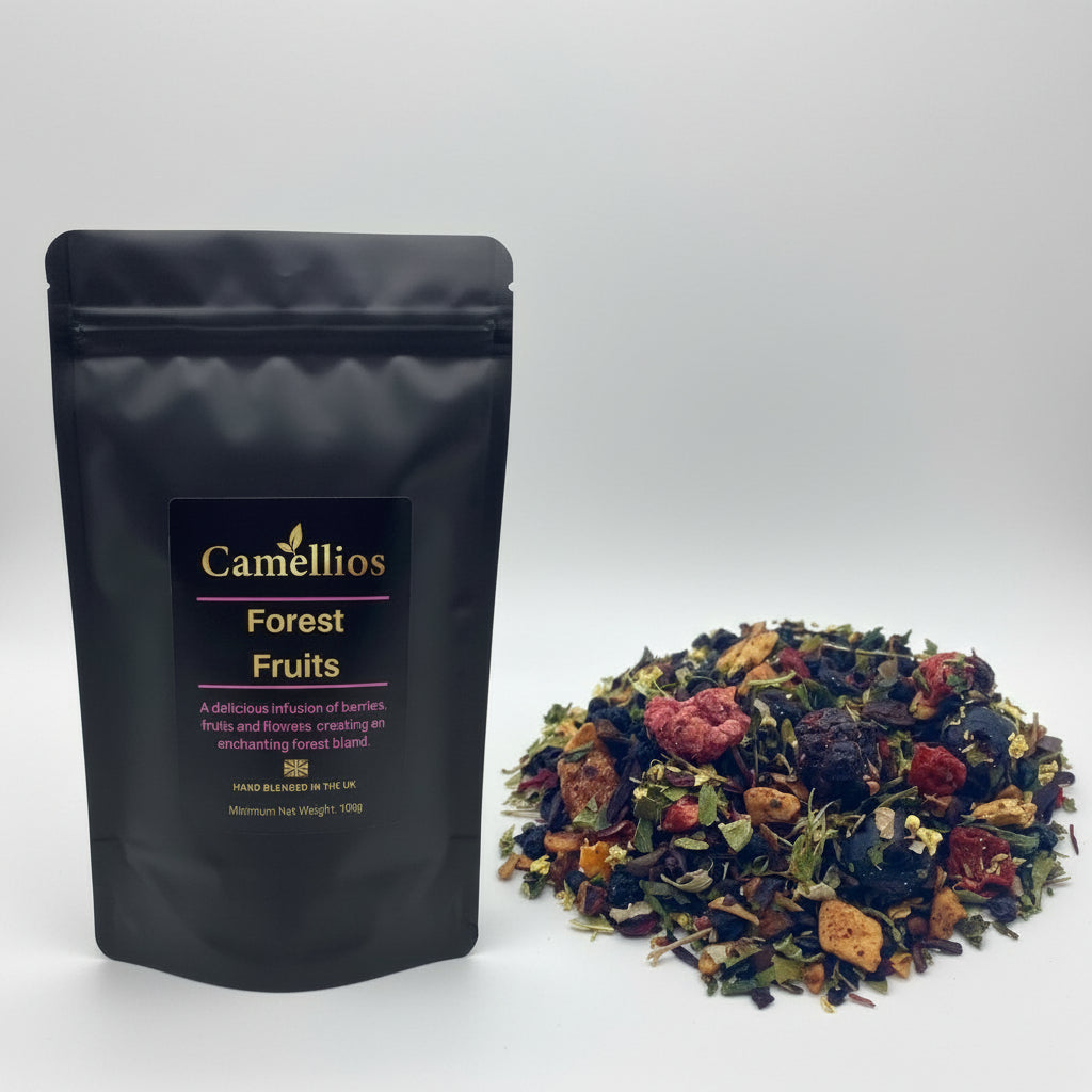 Camellios Forest Fruits tea package with a sample of the tea leaves on a white background